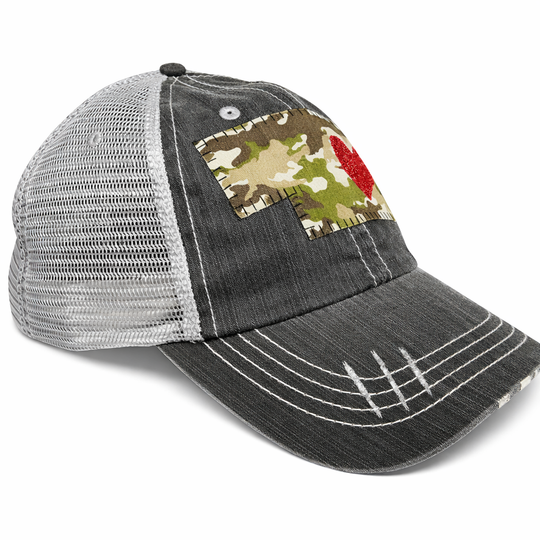 Gray trucker cap with camouflage patch on a white background