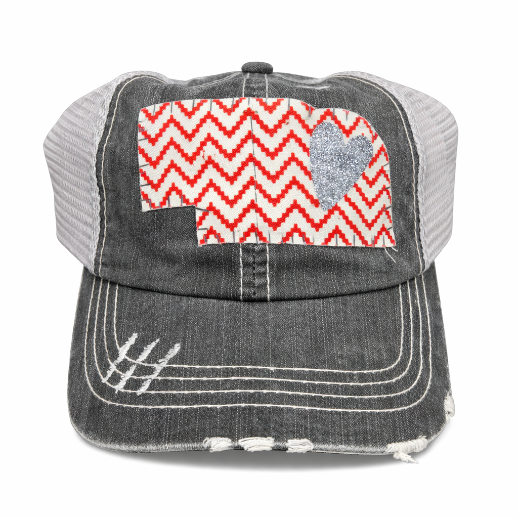 Gray trucker cap with red and white chevron pattern and gray heart on a white background