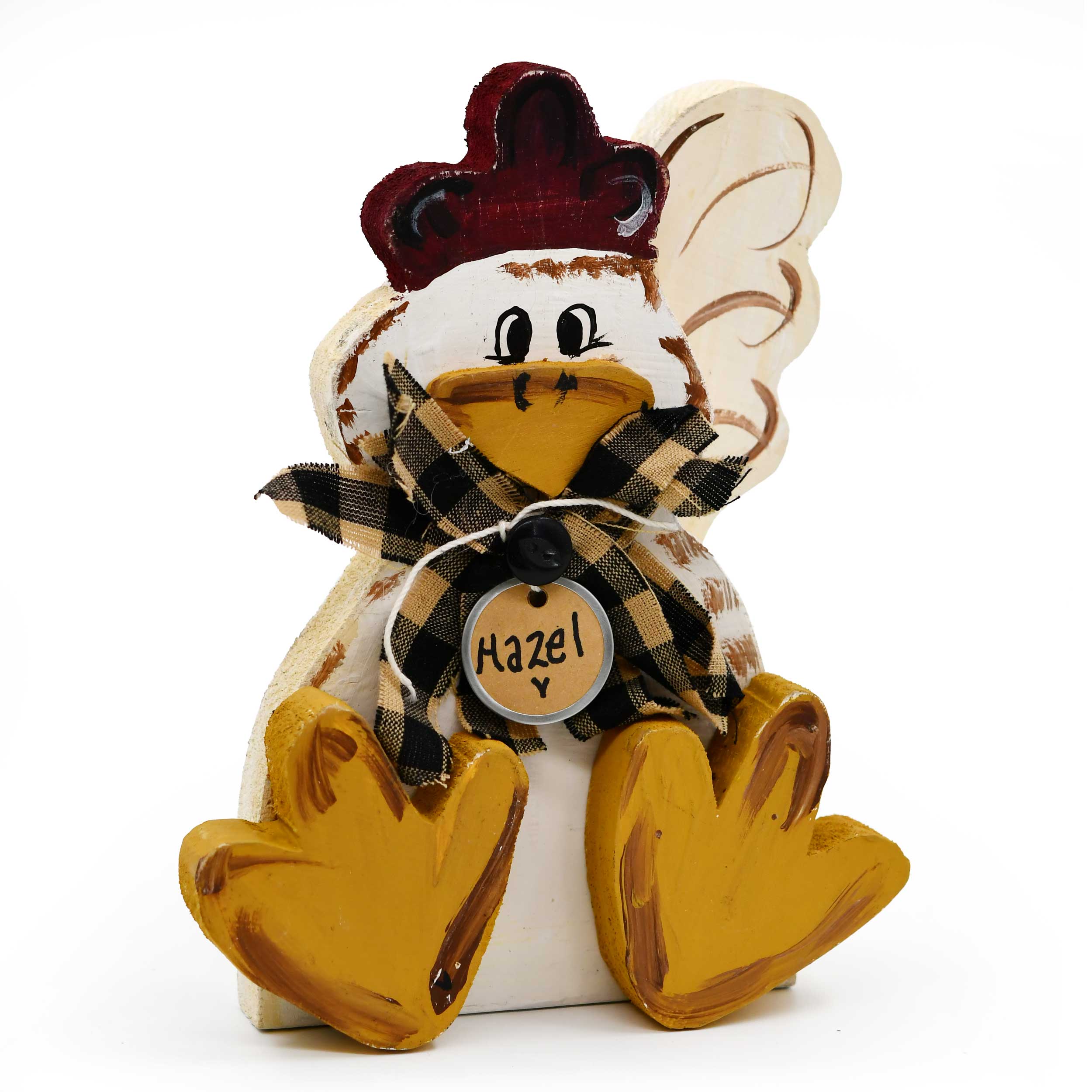 Decorative chicken figurine with a plaid bow and 'Hazel' tag on a white background