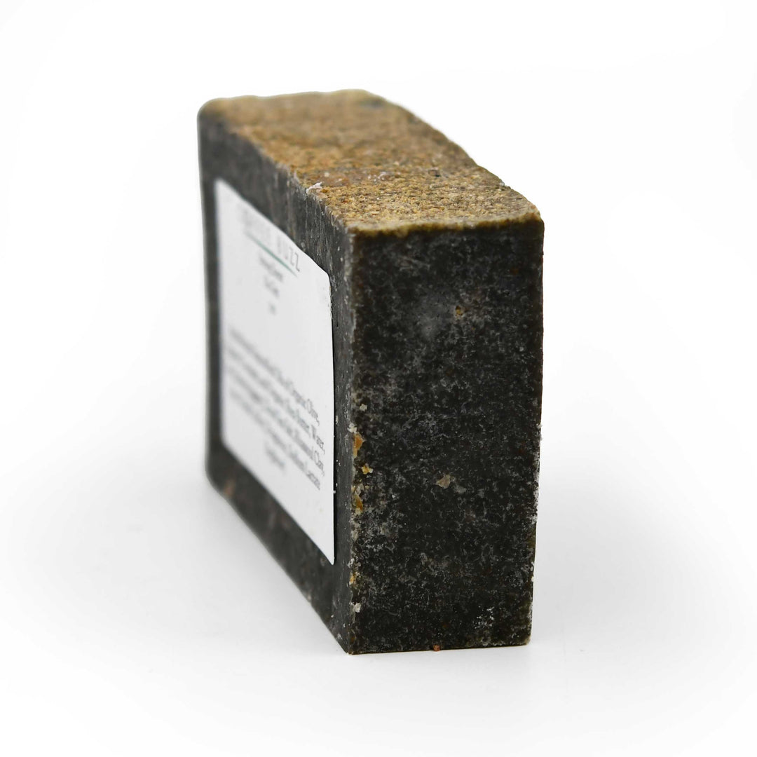 Bar of soap with a label on a white background