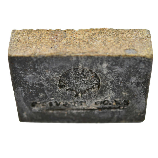 Rectangular bar of soap with a brand logo on a white background