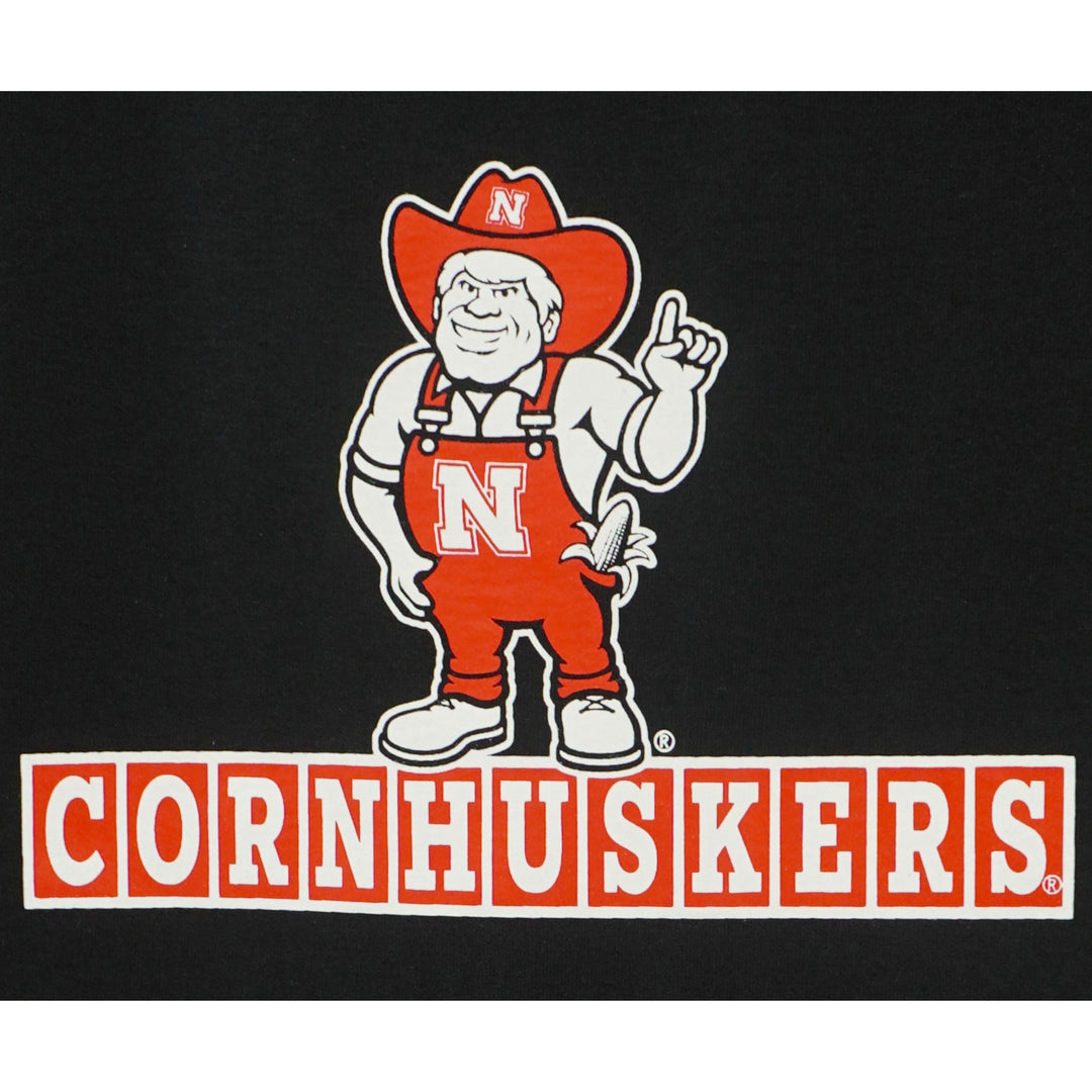 Youth Herbie Husker Cornhuskers T-Shirt | Black | Multiple Sizes | Lou's Sporting Goods | 25N14YBT