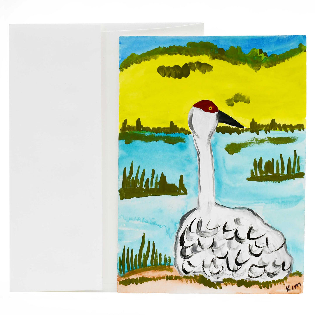 Greeting card with a painted crane in a natural setting