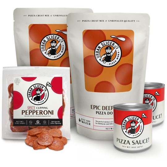Collection of Urban Slicer pizza-making products including pizza crust mix, pepperoni, sauce, and dough on a white background.