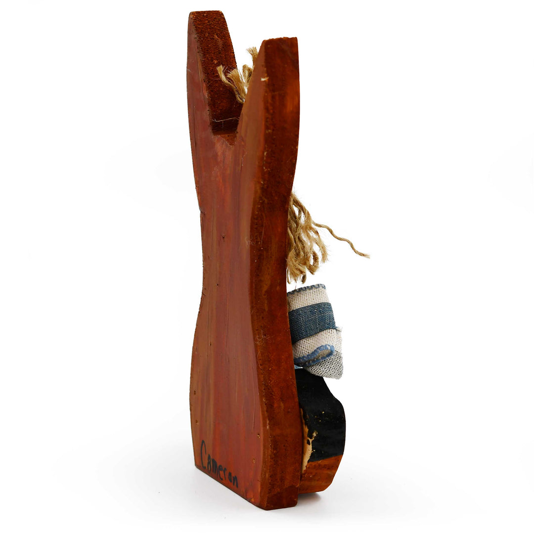 Wooden slipper with a sock inside on a white background