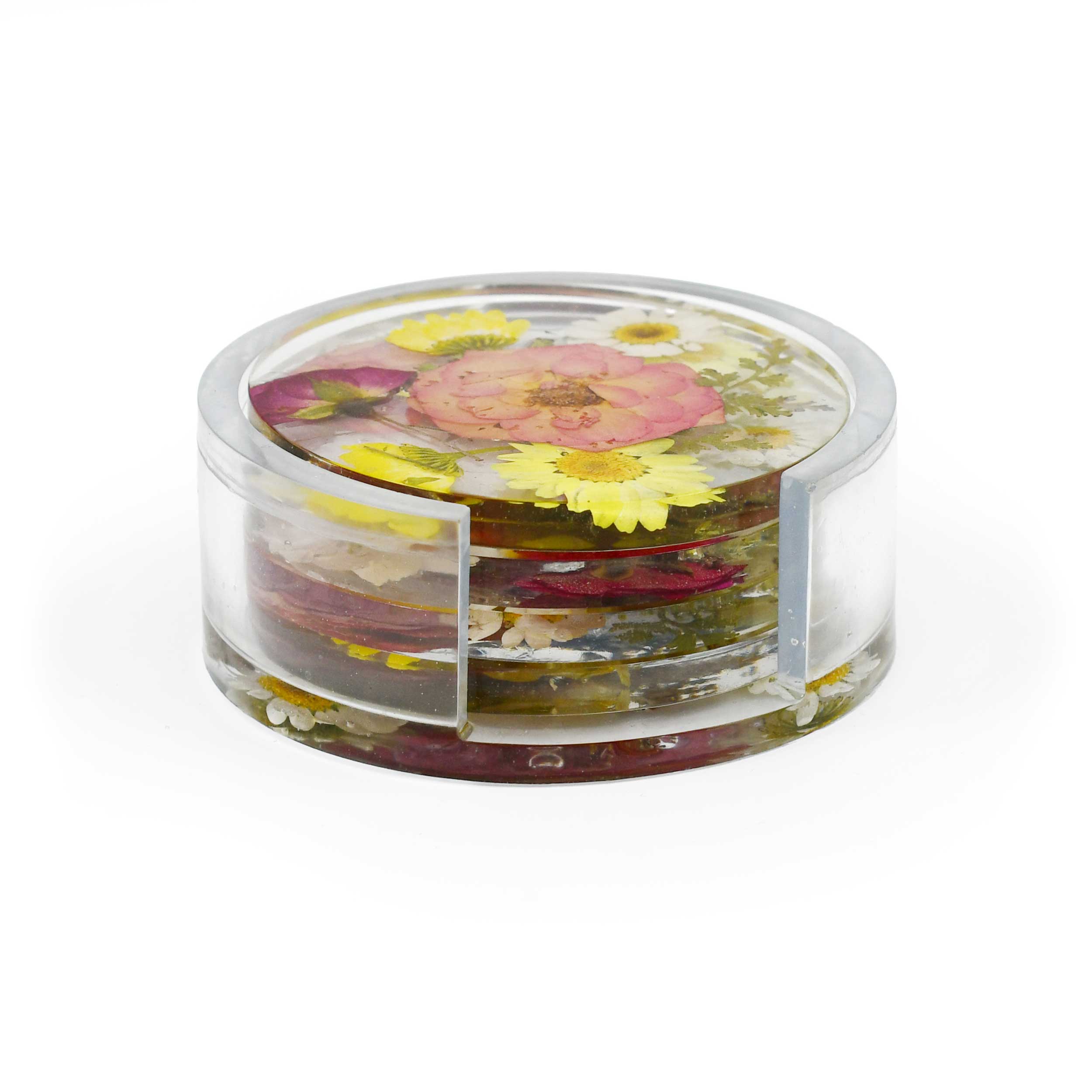 A clear acrylic round container with a lid, filled with dried flowers and botanical pieces, photographed on a clean white background.