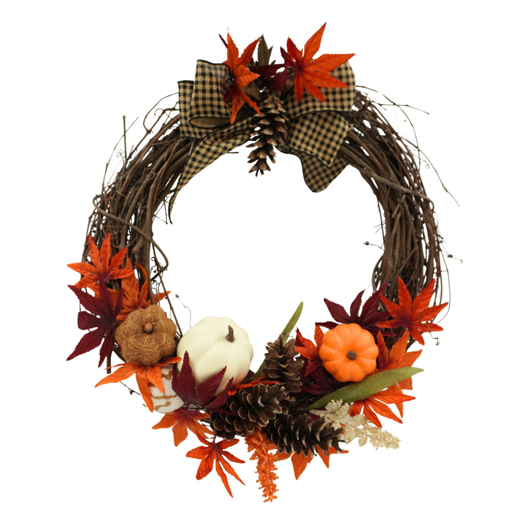 Autumn wreath with leaves, pumpkins, and pinecones on a white background