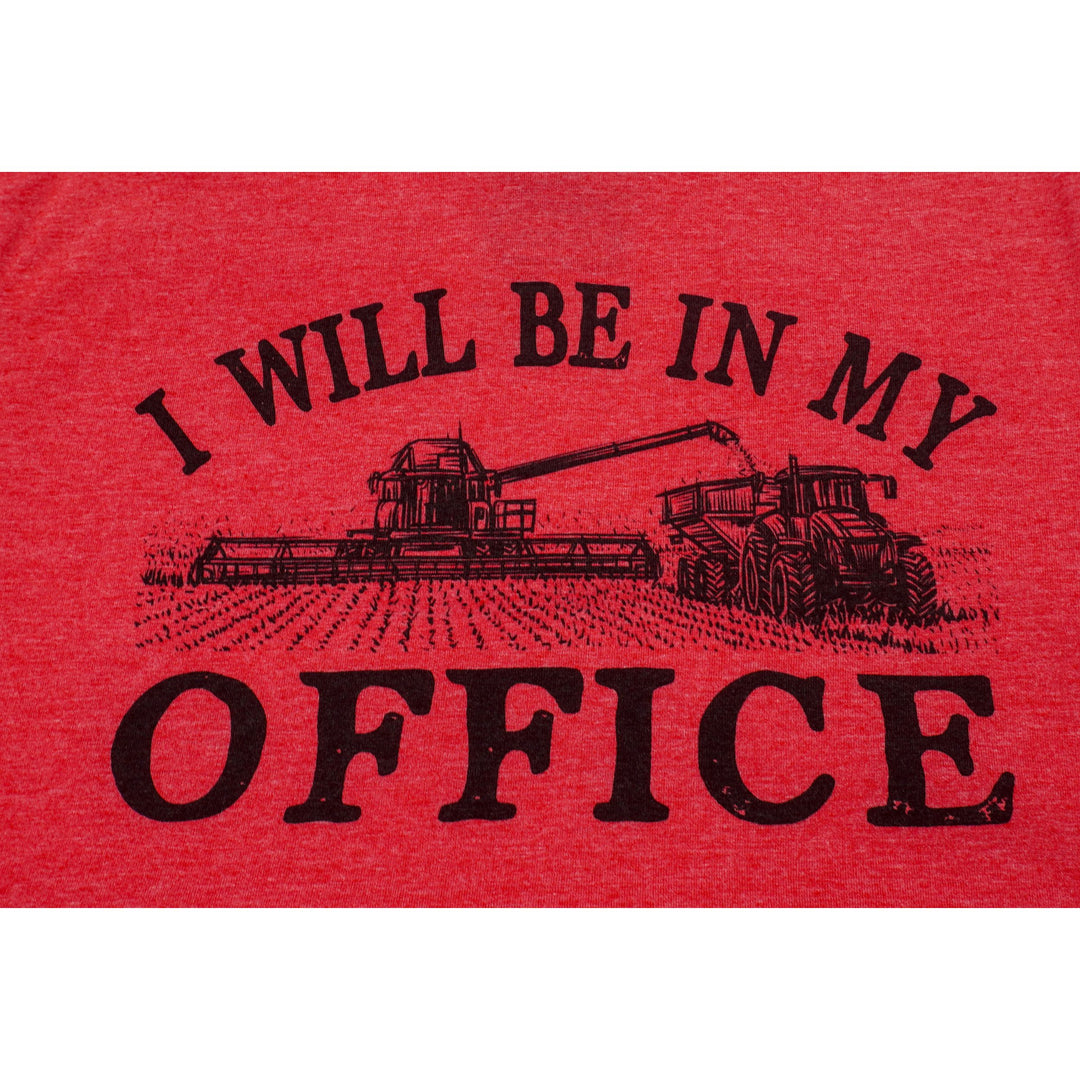 Red shirt with black text and tractor graphic on a white background
