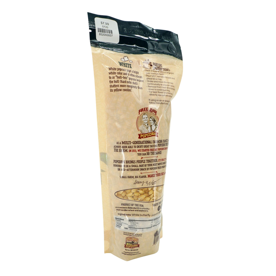 Pouch of popcorn kernels with branding and text on a white background