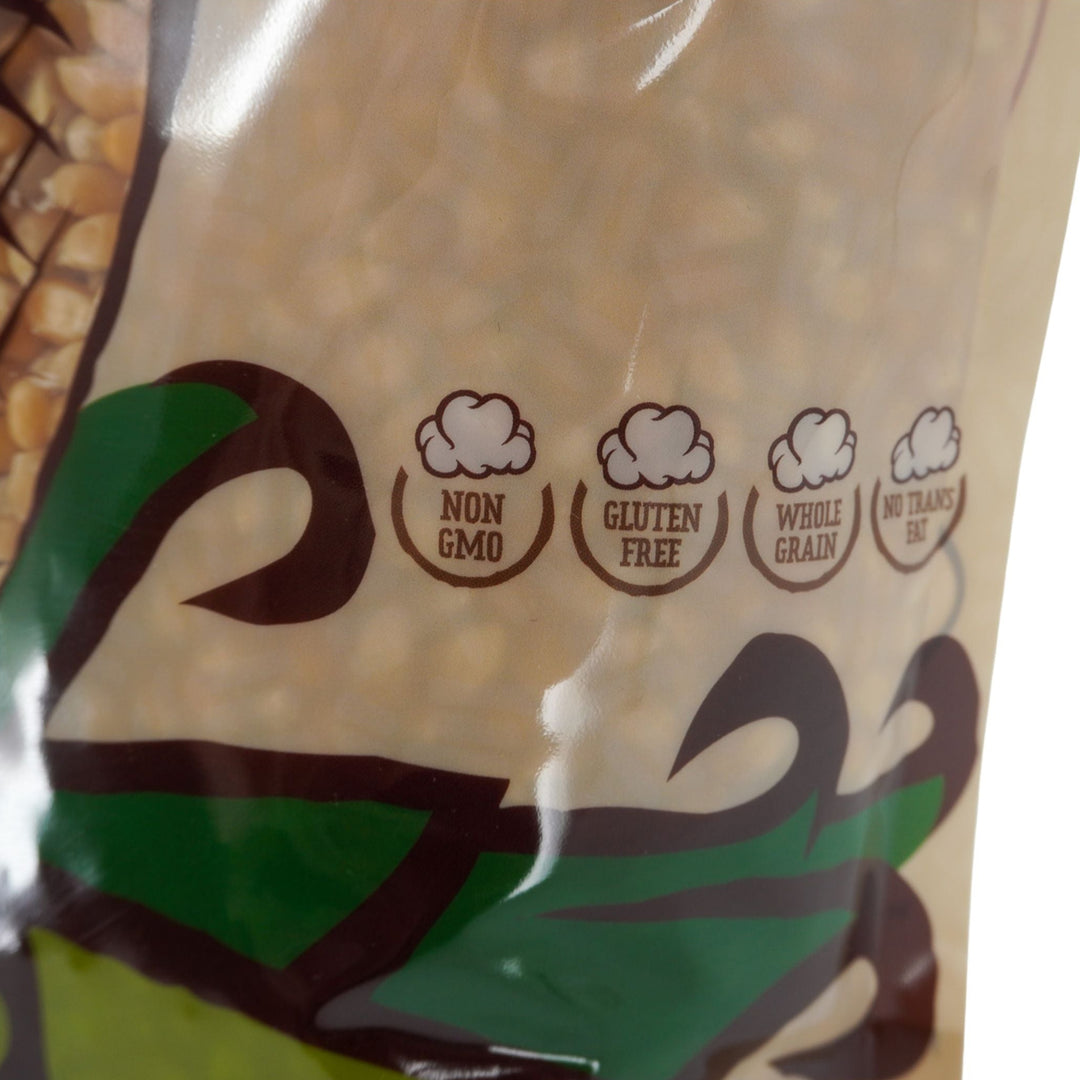 Bag of popcorn kernels with certification labels for non-GMO, gluten-free, whole grain, and no trans fat.