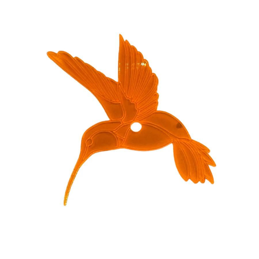 An orange glowing hummingbird on a white background