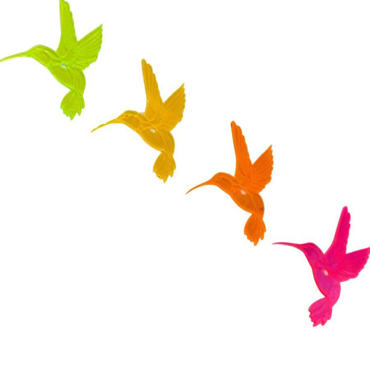 A variety of glowing hummingbirds on a white background. Colors: Green, Yellow, Orange, Pink