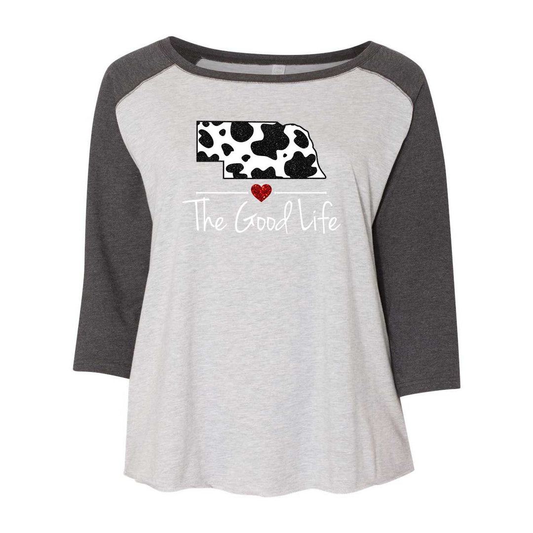 Gray and white baseball shirt with cow print and heart design on a white background