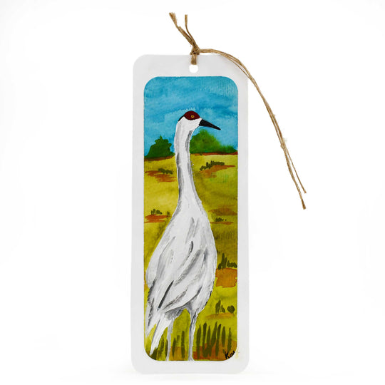 Bookmark with a crane illustration on a scenic background