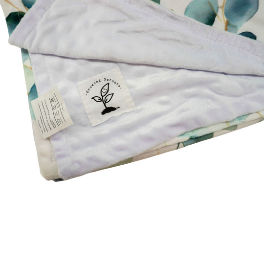 Folded towel with a label on a white background