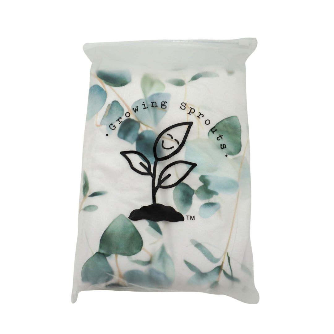 Product packaging with 'Growing Sprouts' logo and leaf design on a white background