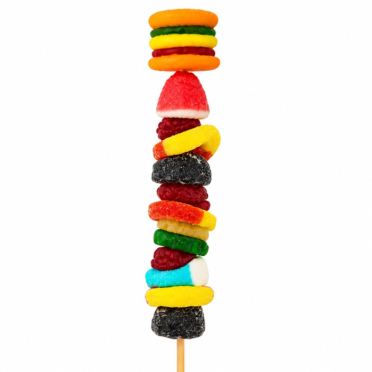 Hamburger candy kabob featuring a gummy hamburger topper and colorful gummy candies arranged on a wooden skewer, isolated on a white background.