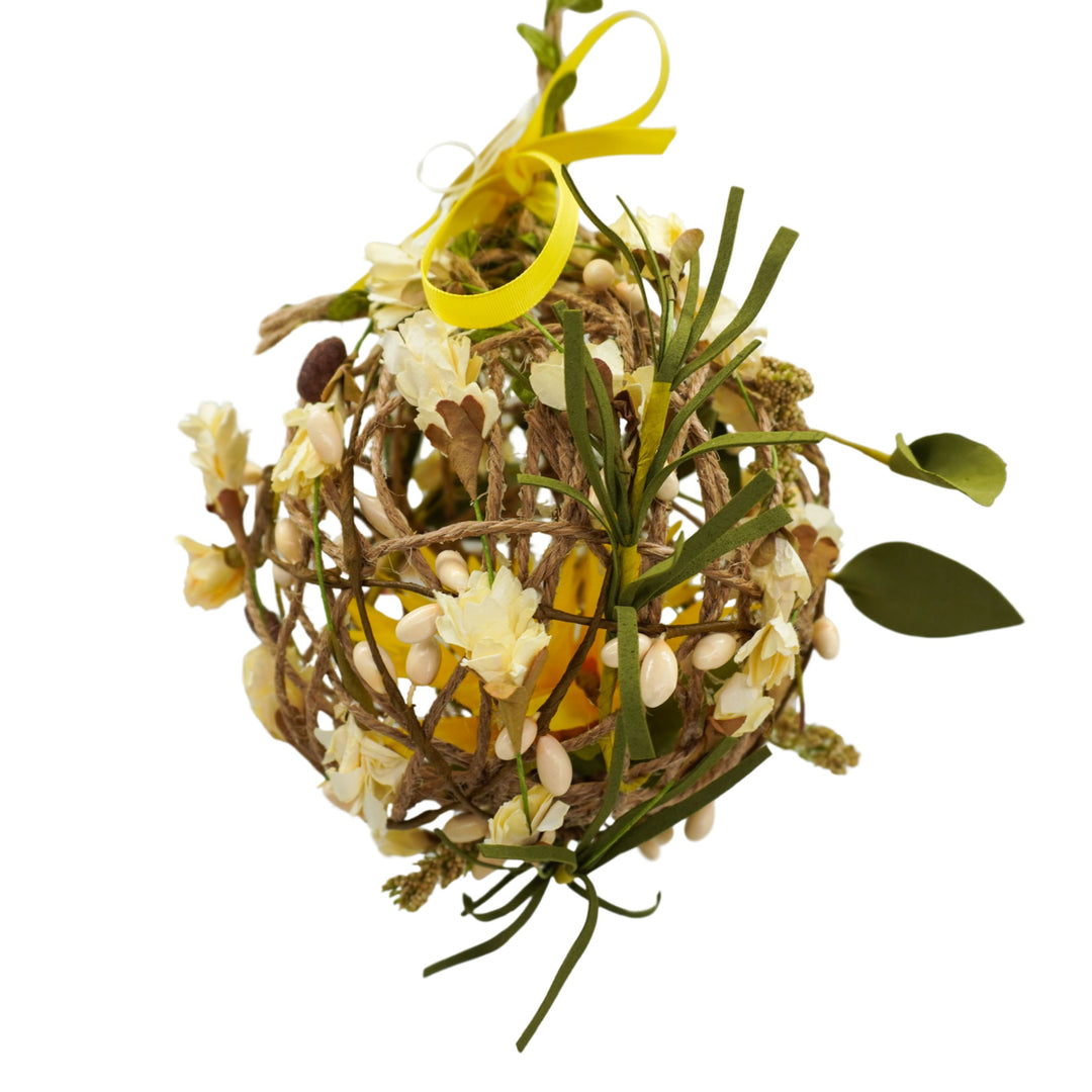 Decorative wreath with flowers and greenery on a white background