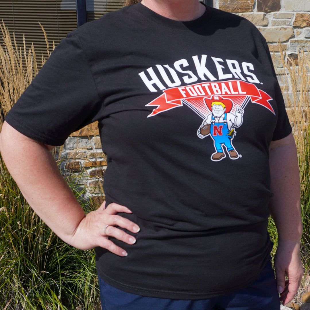 Herbie Husker Women's T-Shirt | Black | Multiple Sizes | Lou's Sporting Goods | 25N13DM104L