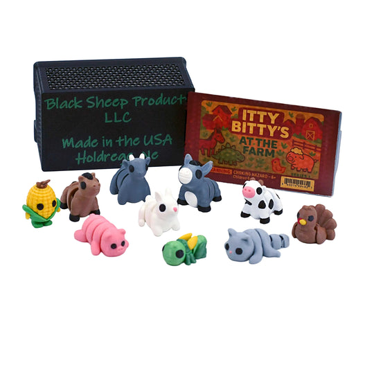 Collection of small animal figurines with packaging on a white background