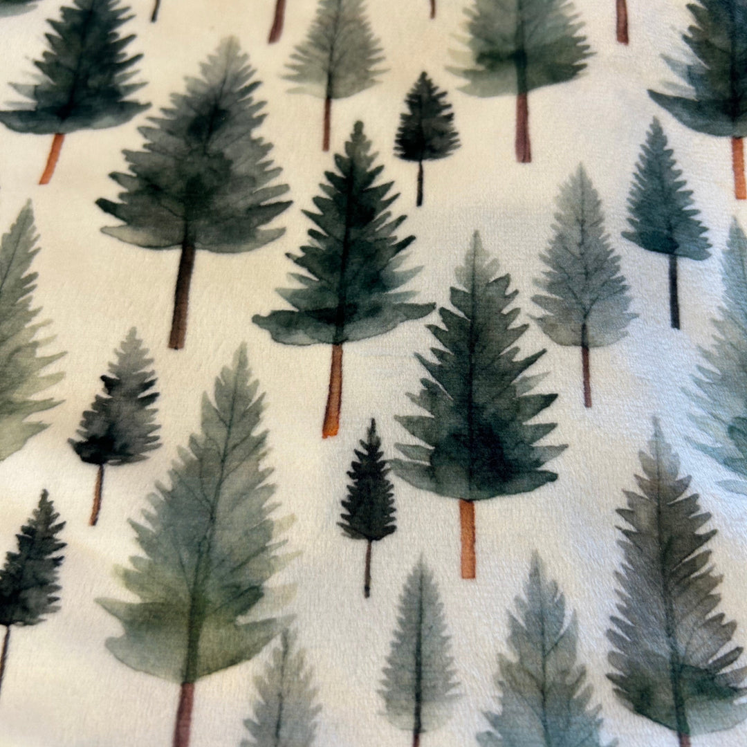 Pattern of watercolor trees on a light background