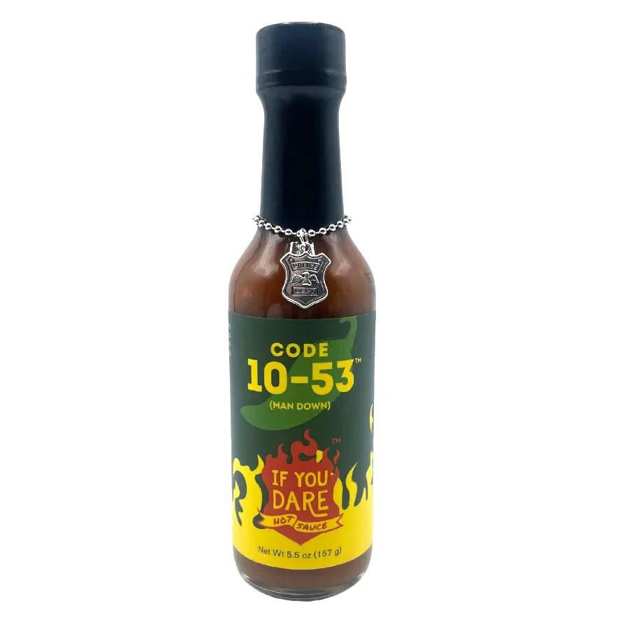 A bottle of Code 10-53 If You Dare Hot Sauce on a white background
