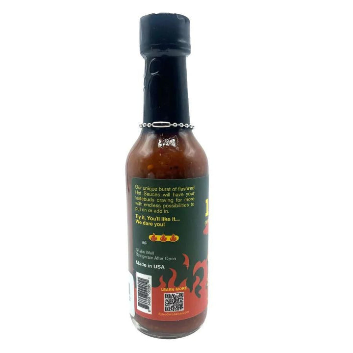 The side of a bottle of Code 10-52 If You Dare Hot Sauce on a white background