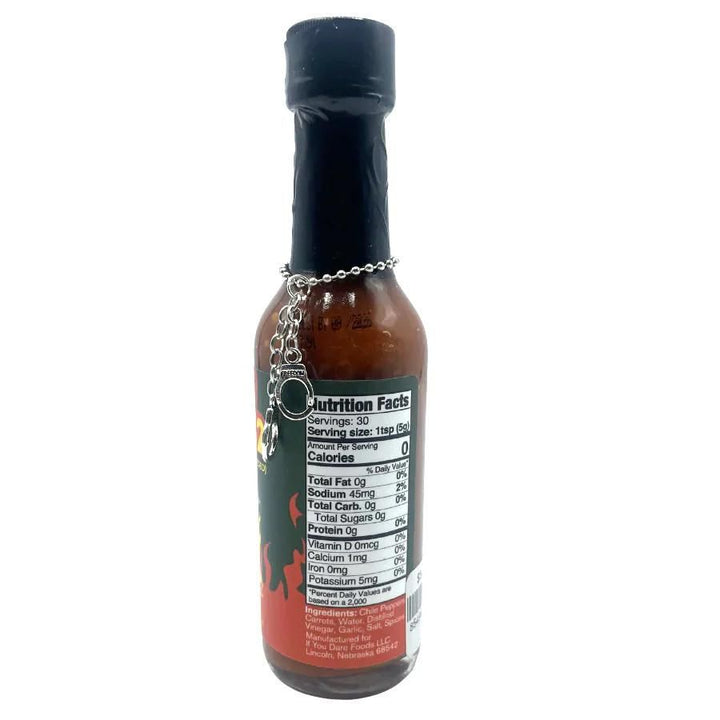 The nutrition fact label/side of a bottle of Code 10-52 If You Dare Hot Sauce on a white background