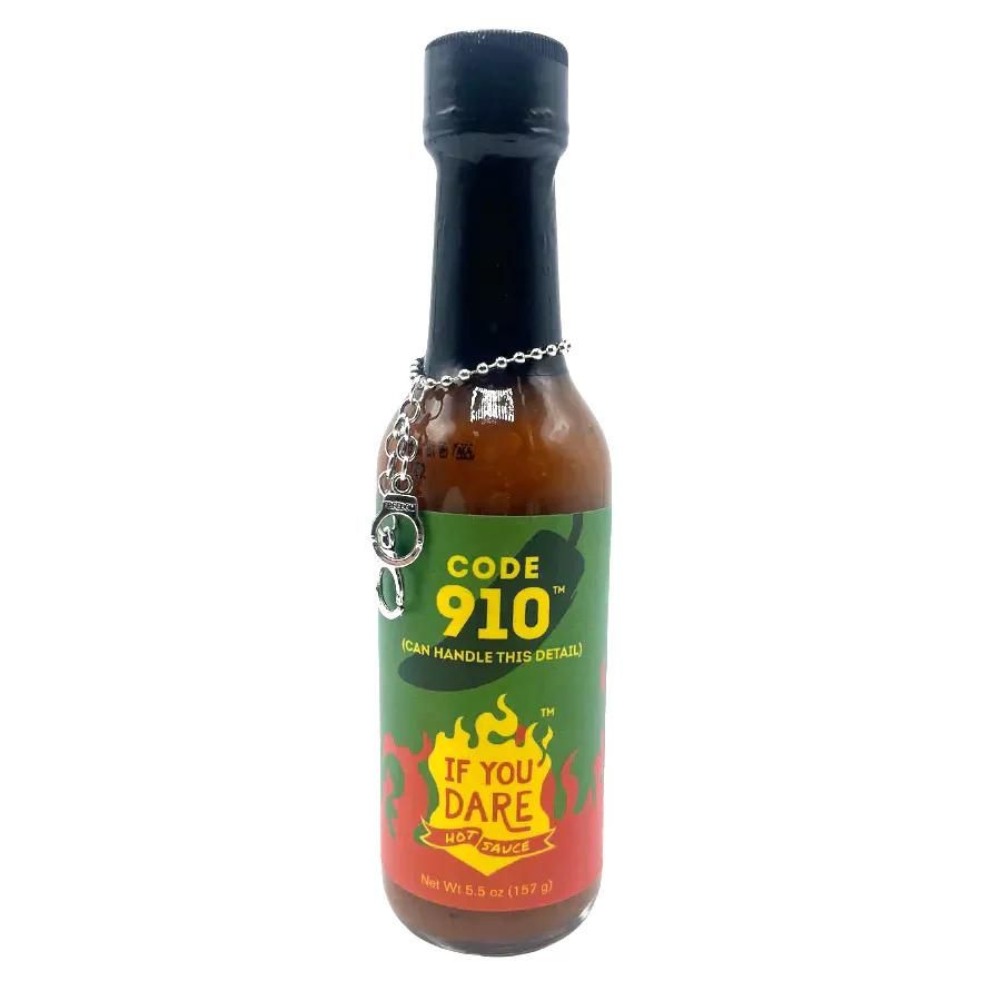 A bottle of Code 910 If You Dare Hot Sauce on a white background