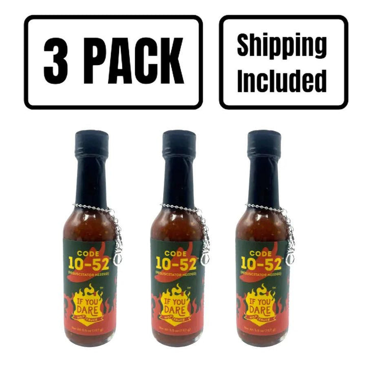 A three pack of Code 10-52 If You Dare Hot Sauce on a white background