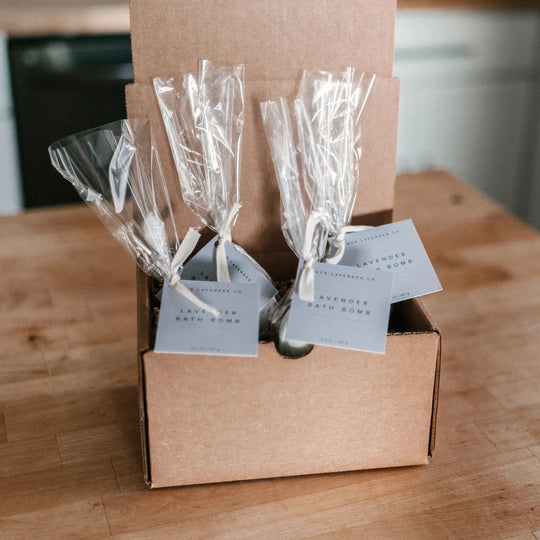set of four lavender bath bombs in a shipping box