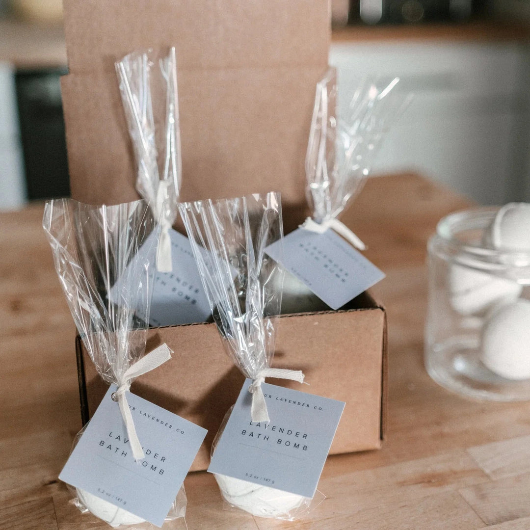 set of four lavender bath bombs in a shipping box