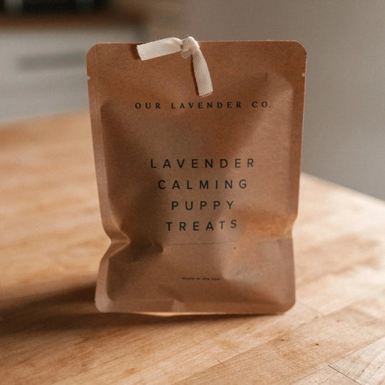 Our Lavender Co Lavender Calming Puppy Treats on a wood counter