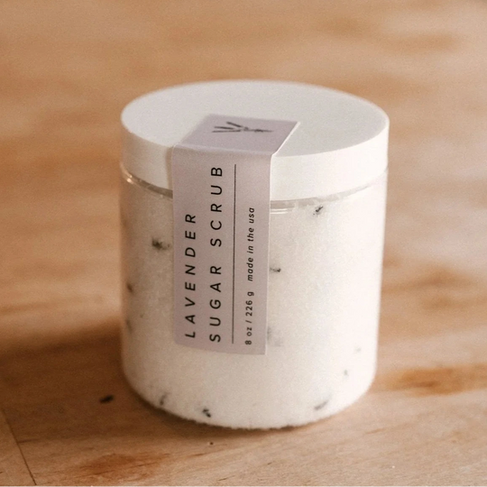 lavender sugar scrub by our lavender co on wood table