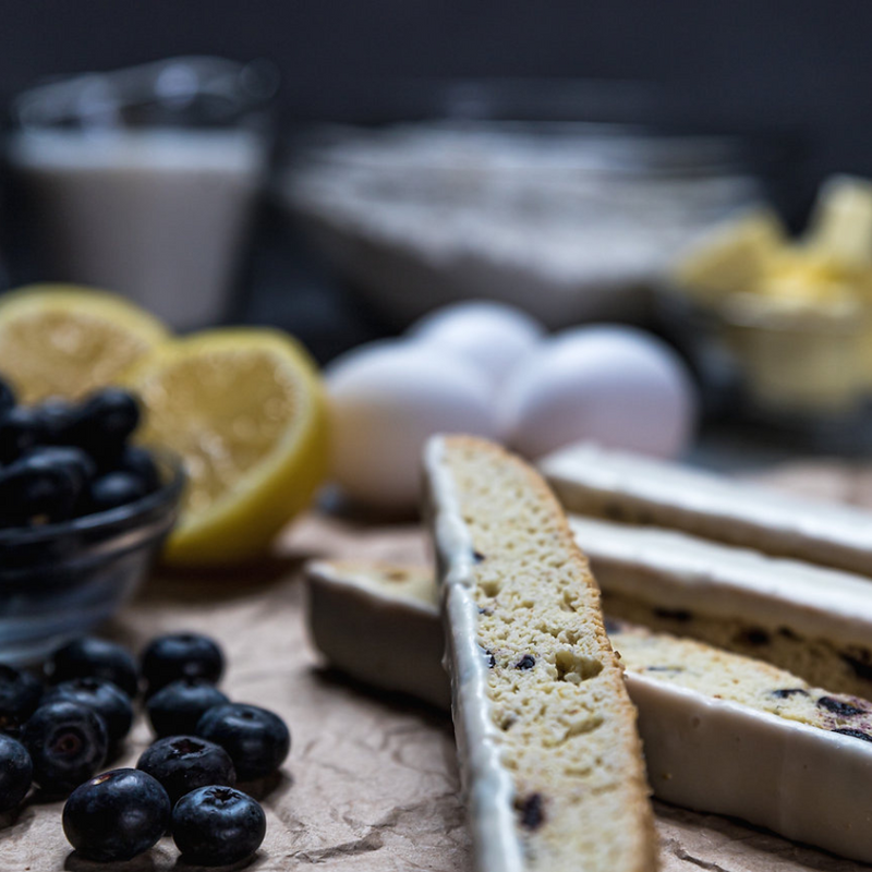 Lemon Blueberry Biscotti | Made with Plump, Dried Blueberries | Soft, Lemony Flavor | Perfect For Dunking In A Cup Of Tea | Coated in Rich, White Chocolate | Top Seller | Omaha, Nebraska Biscotti | Undippably Edible
