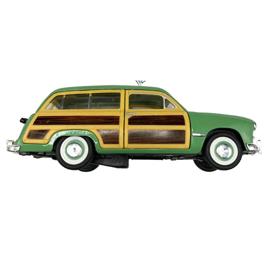 Side profile of a green Scale 1949 Ford Woody Figurine