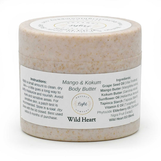 A round plastic jar of Wild Heart Body Butter with a white label and a light beige textured cream inside, set against a plain white background.