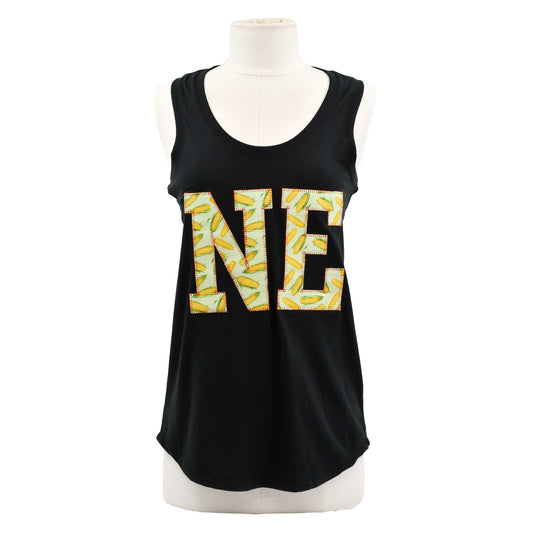 A black sleeveless tank top displayed on a white mannequin torso against a plain white background. The front features a large 'NE' graphic in yellow and white patterned lettering.