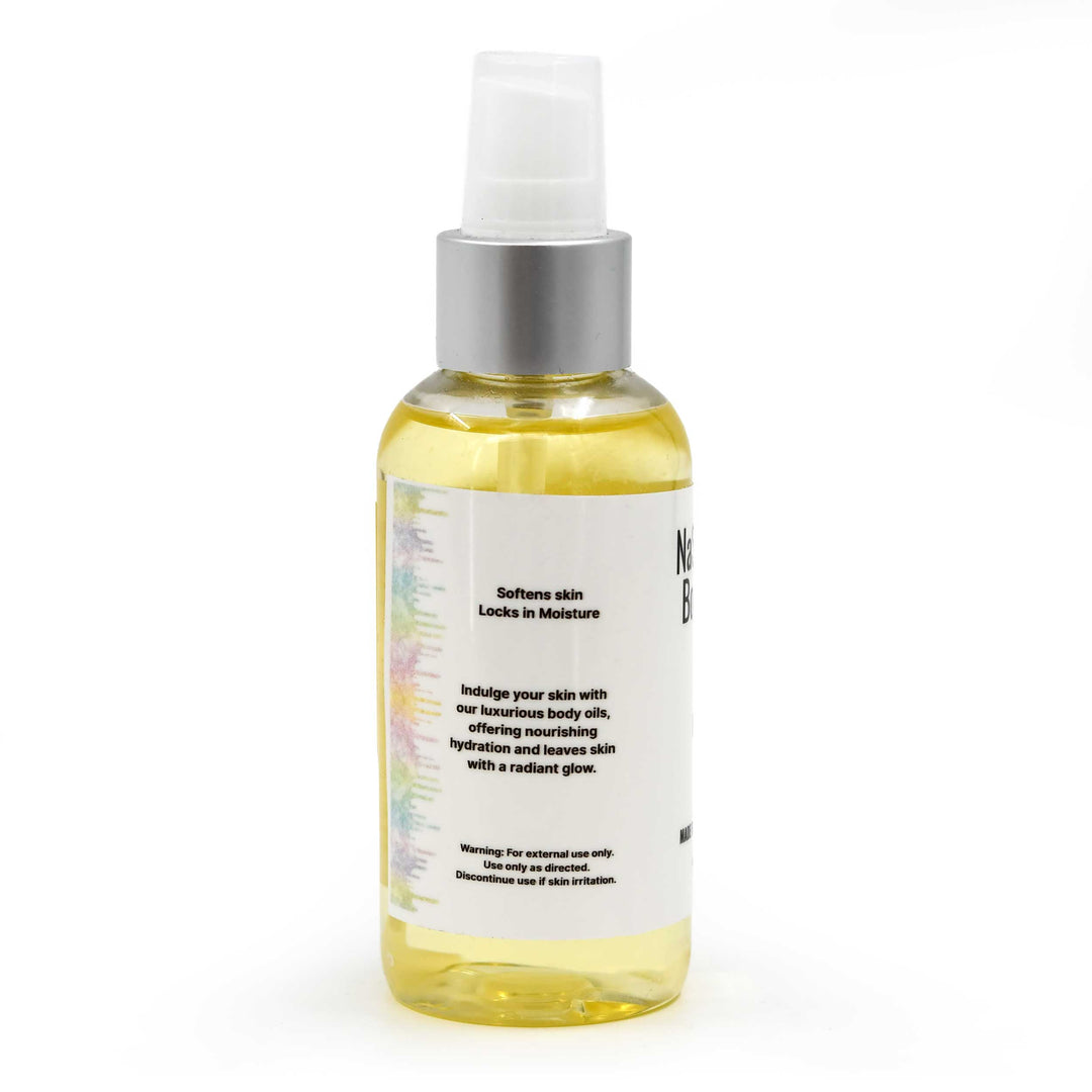 Bottle of body oil with a white label on a white background