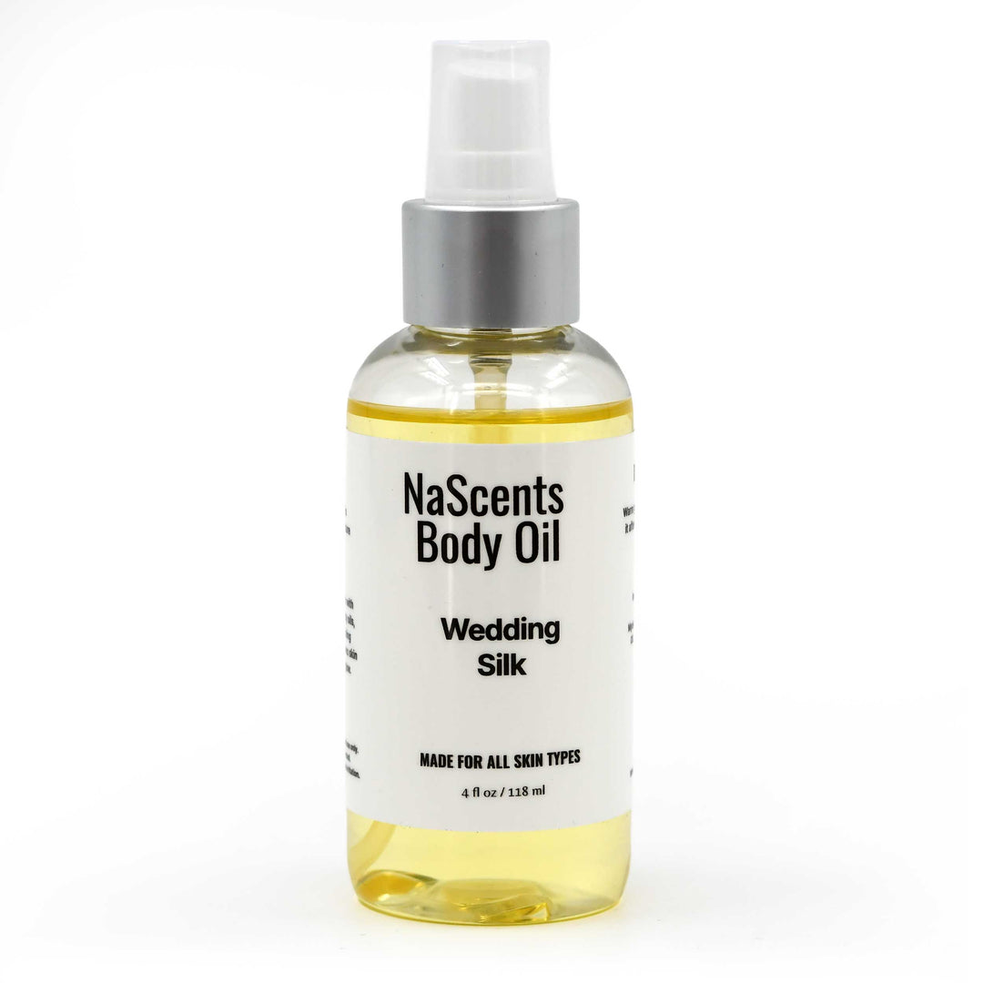 Bottle of NaScents Body Oil labeled 'Wedding Silk' on a white background