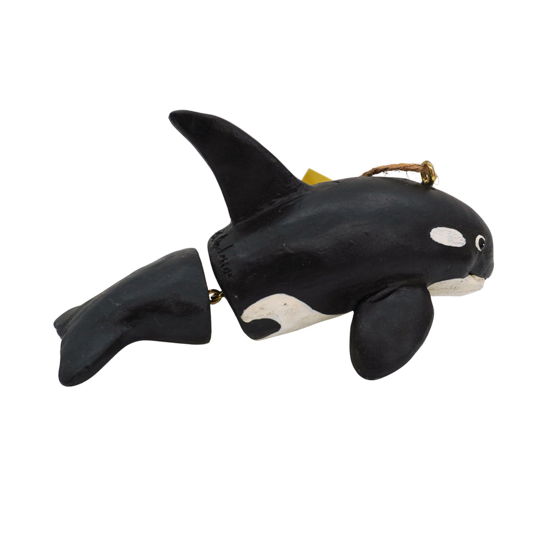 Plush toy orca whale on a white background
