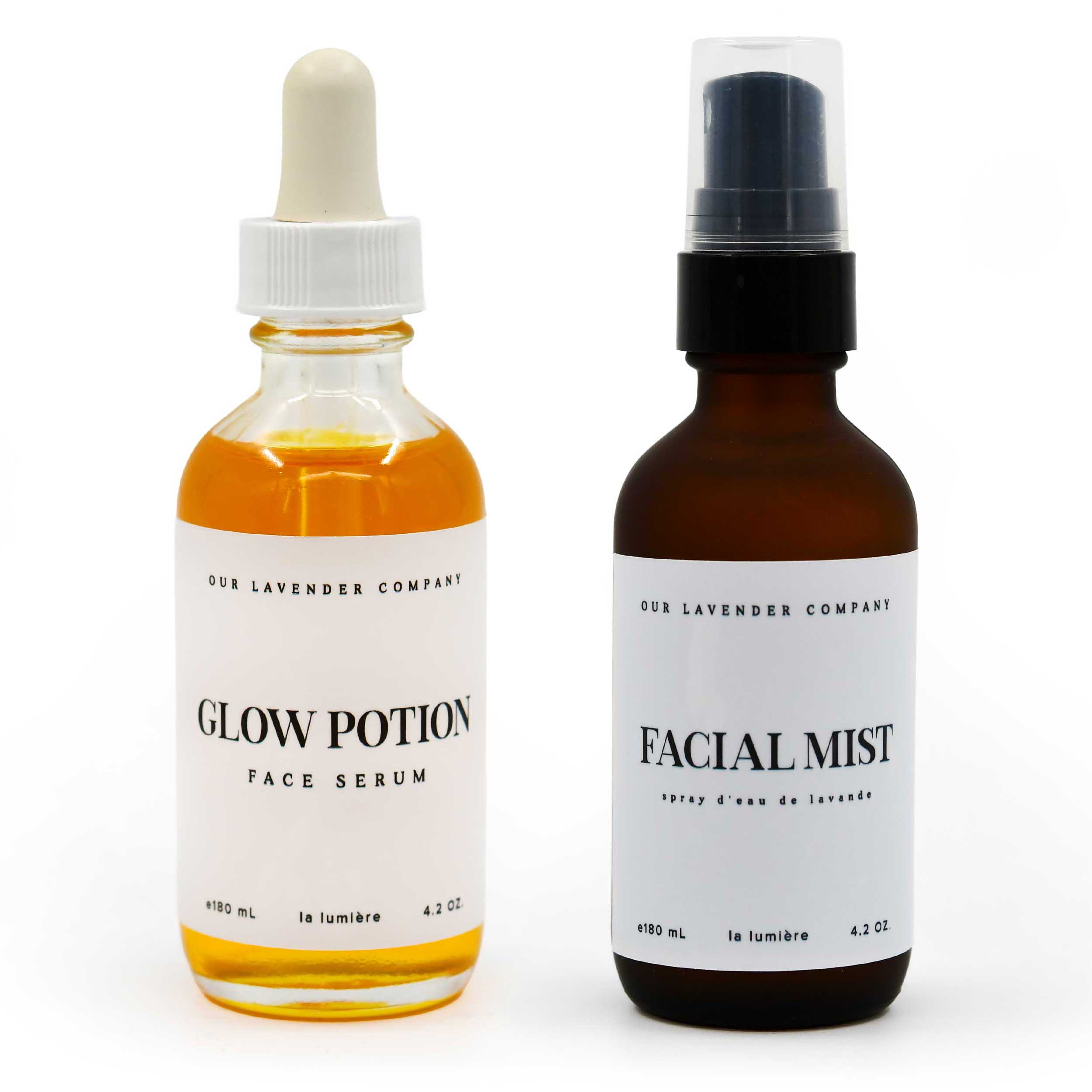 Two bottles of facial serum and mist from 'Our Lavender Company' on a white background.