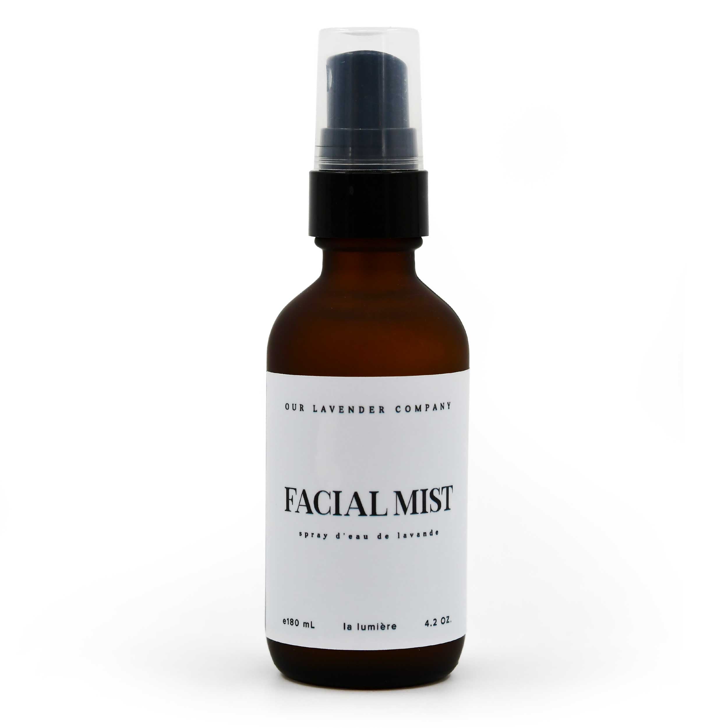 Facial mist bottle with a white label on a white background