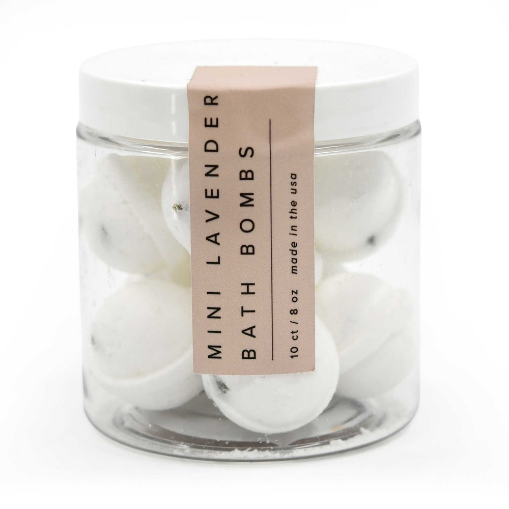 Jar of mini lavender bath bombs with a label on a white background