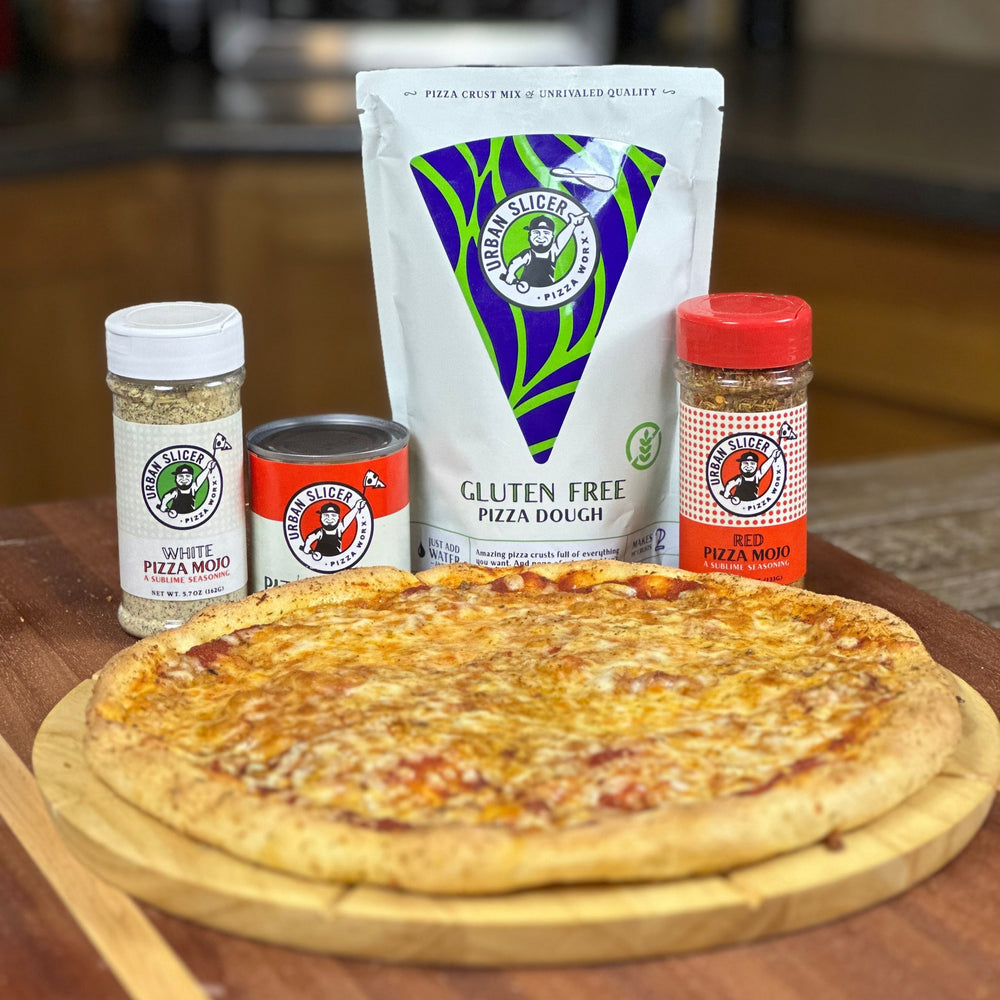 Pizza with pizza dough, sauce, and seasoning on a wooden board