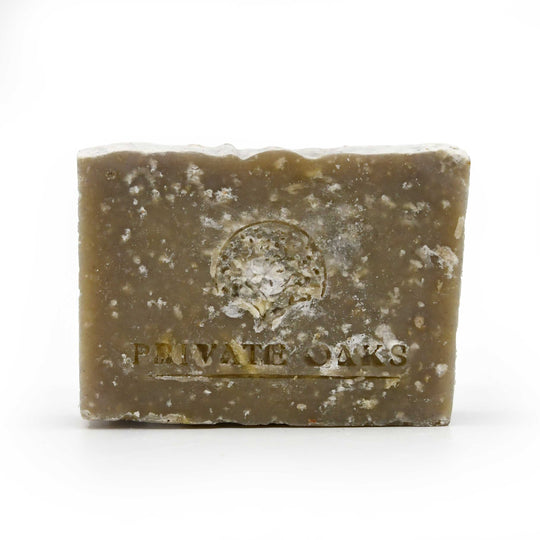 Bar of soap with 'Private Oaks' branding on a white background
