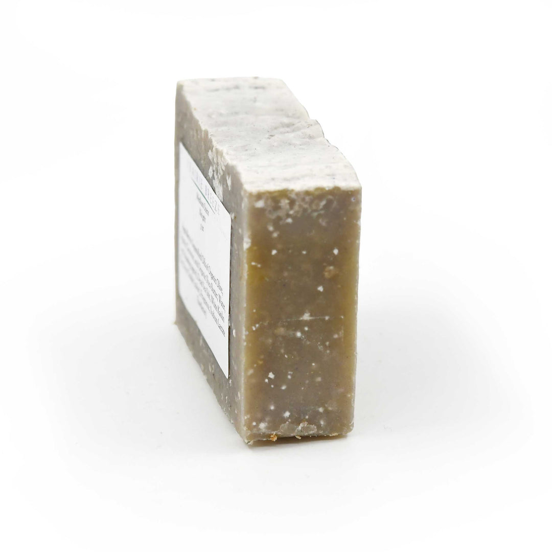 Bar of soap with a label on a white background
