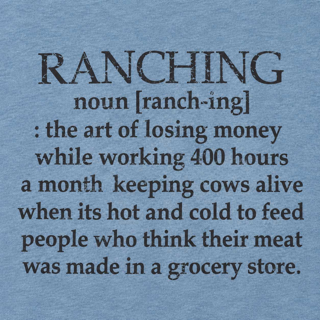 A close-up of a heathered blue fabric surface with dark gray printed text defining the word 'RANCHING' with a humorous ranching description.