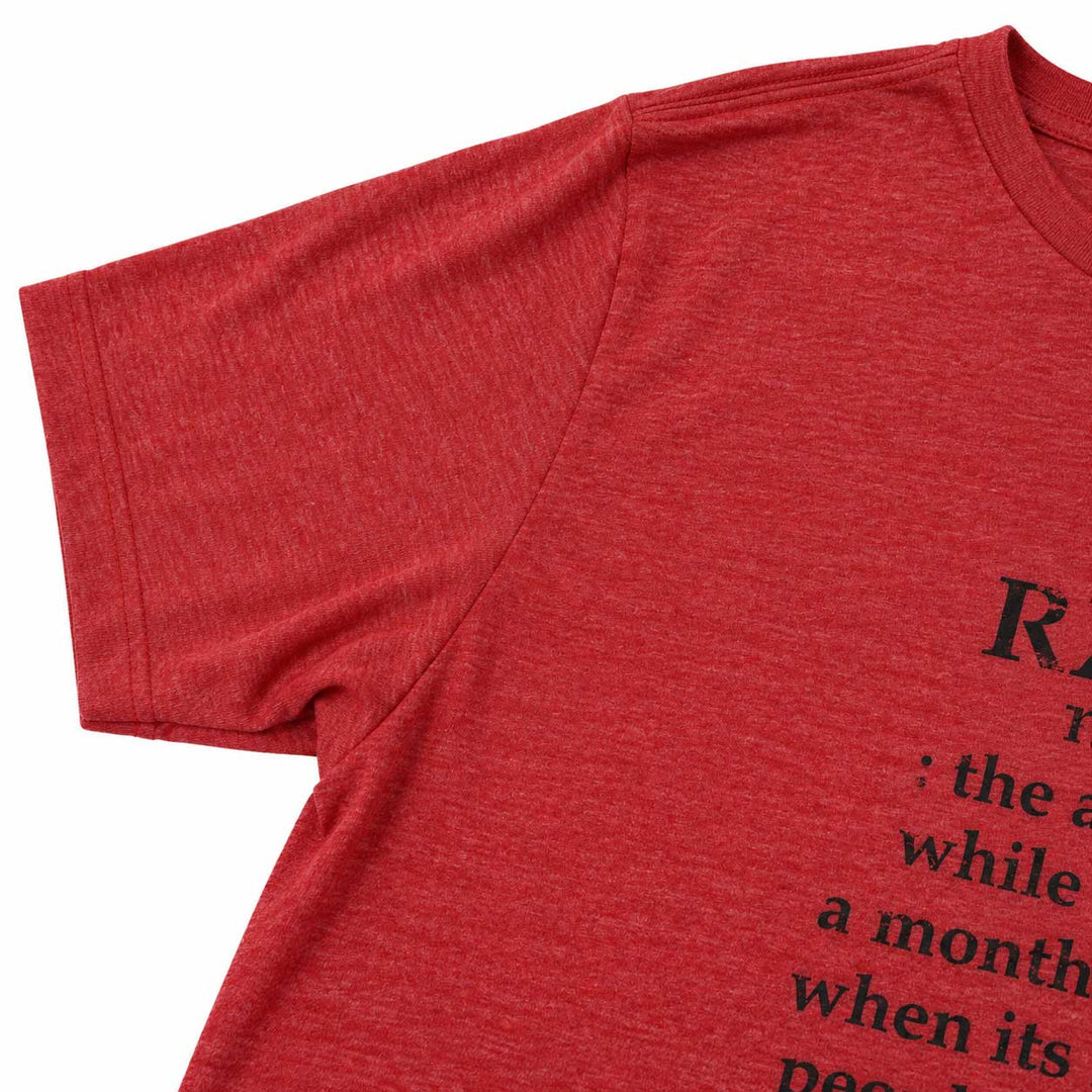 A close-up of a heather red short-sleeve t-shirt showing the shoulder, sleeve, and part of the printed black text on the chest against a white background.