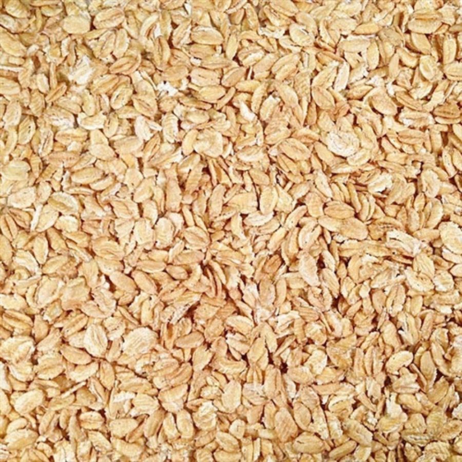 Pile Of Raw, Whole, Organic Rolled Kamut Wheat